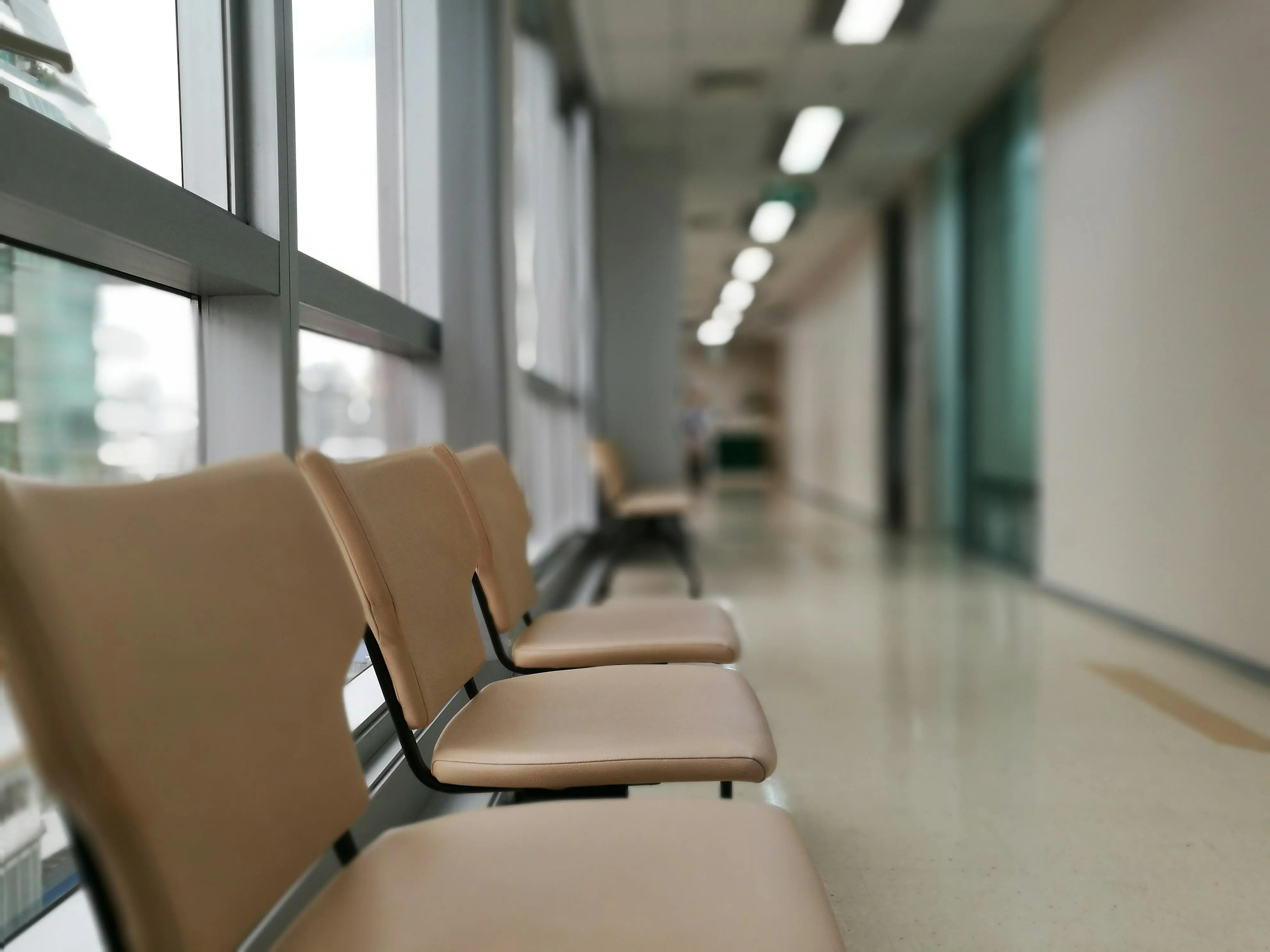 Empty seating in a bright healthcare waiting area